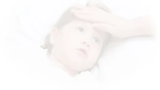 Young child with an adults hand on their forehead